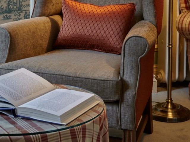 Relax in a comfy armchair in The Reading Room