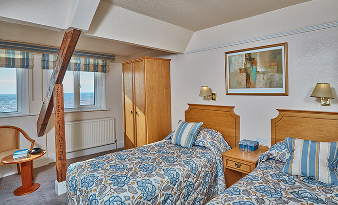Sea view twin bedroom at The Royal York & Faulkner Hotel, Sidmouth
