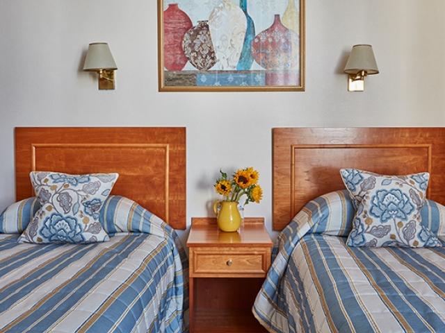 Comfortable twin bedroom at The Royal York & Faulkner Hotel, Sidmouth